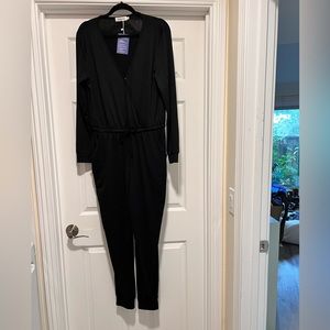 Long sleeve black jumpsuit.